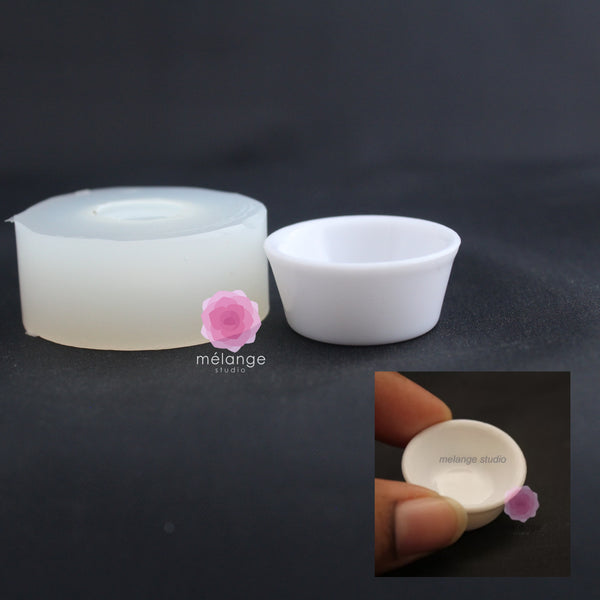 Silicone bowl mould with a white flared cast miniature bowl