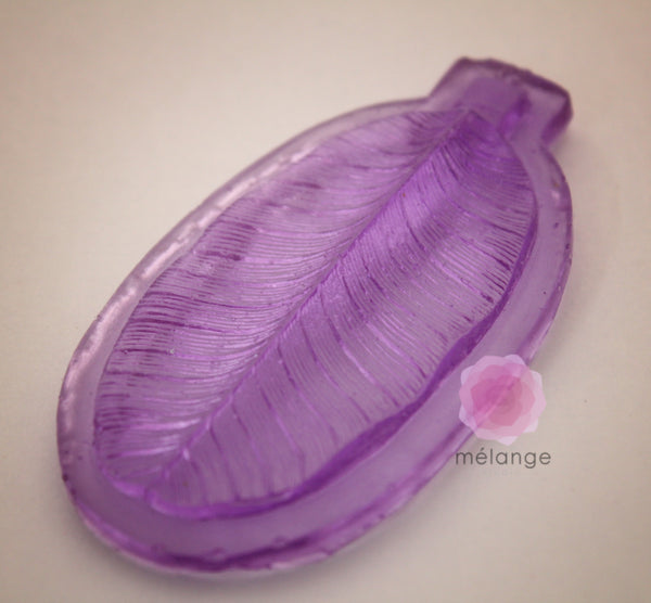 Resin banana leaf veiner tool showing detailed vein texture impression for clay and resin crafts